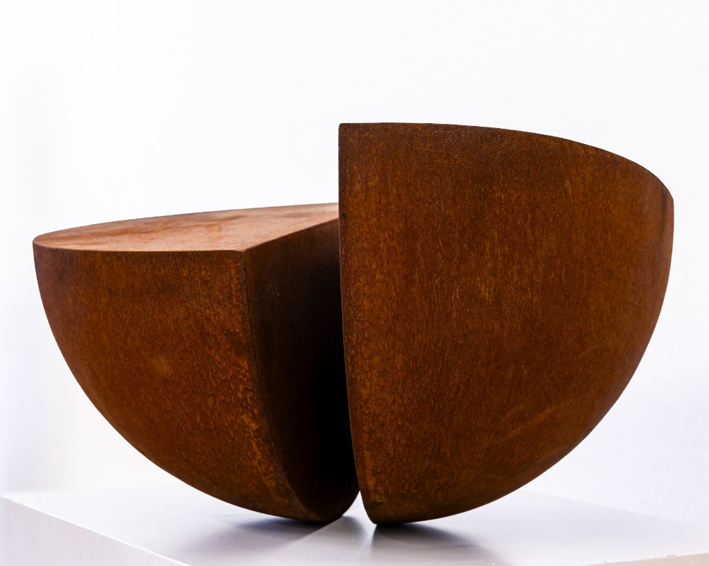 Split hemisphere in rust patina